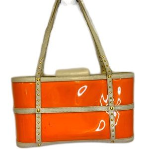 Maxx New York neon orange vinyl tote with cream poly trim and blue lining